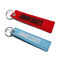 Merrow Border Embroidered Key Chains Fabric Material OEM With Metal Ring Eyelet